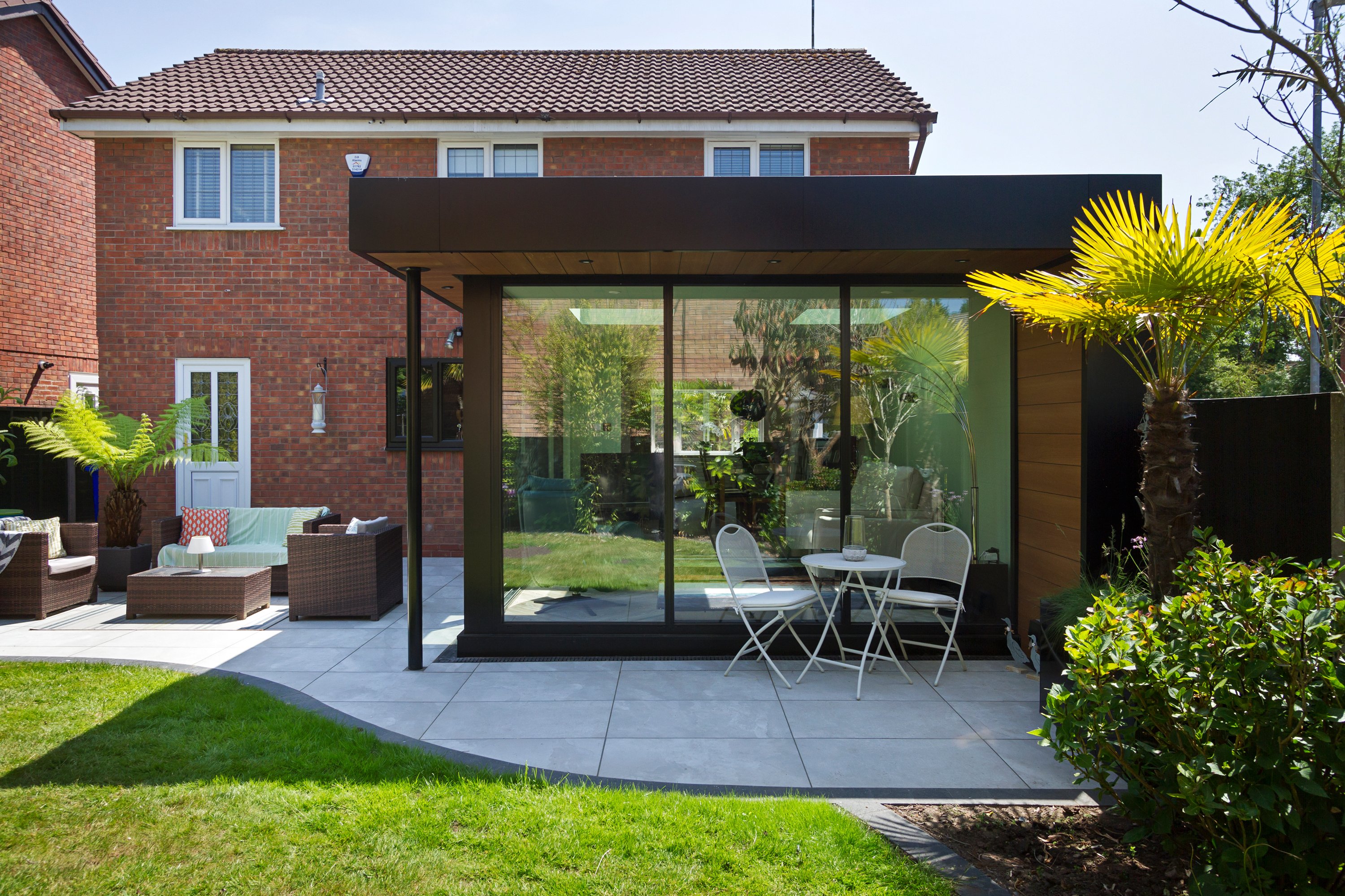 House with glass box extension